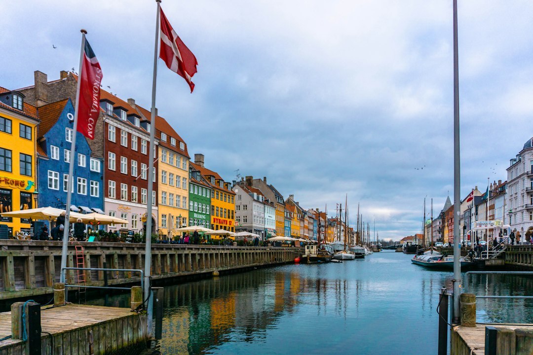 Colorful historic townhouses along a Copenhagen canal