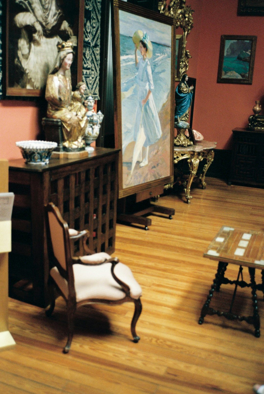 Cozy photography studio interior with prints on the wall